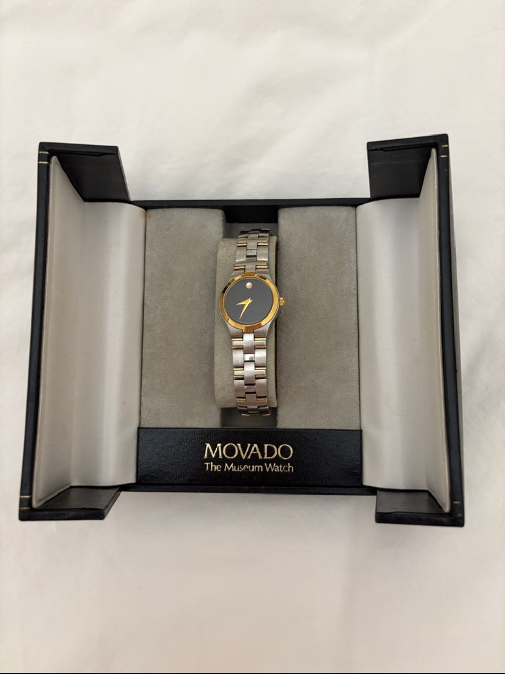 Movado Two-Tone Watch with Black Dial and Gold Accents
